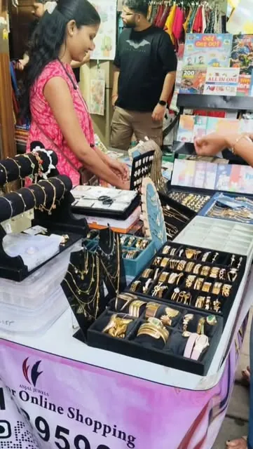 Trays of gold-tone rings, bracelets and watches